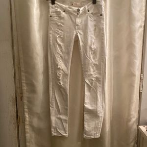 White distressed Levi jeans for girl.
